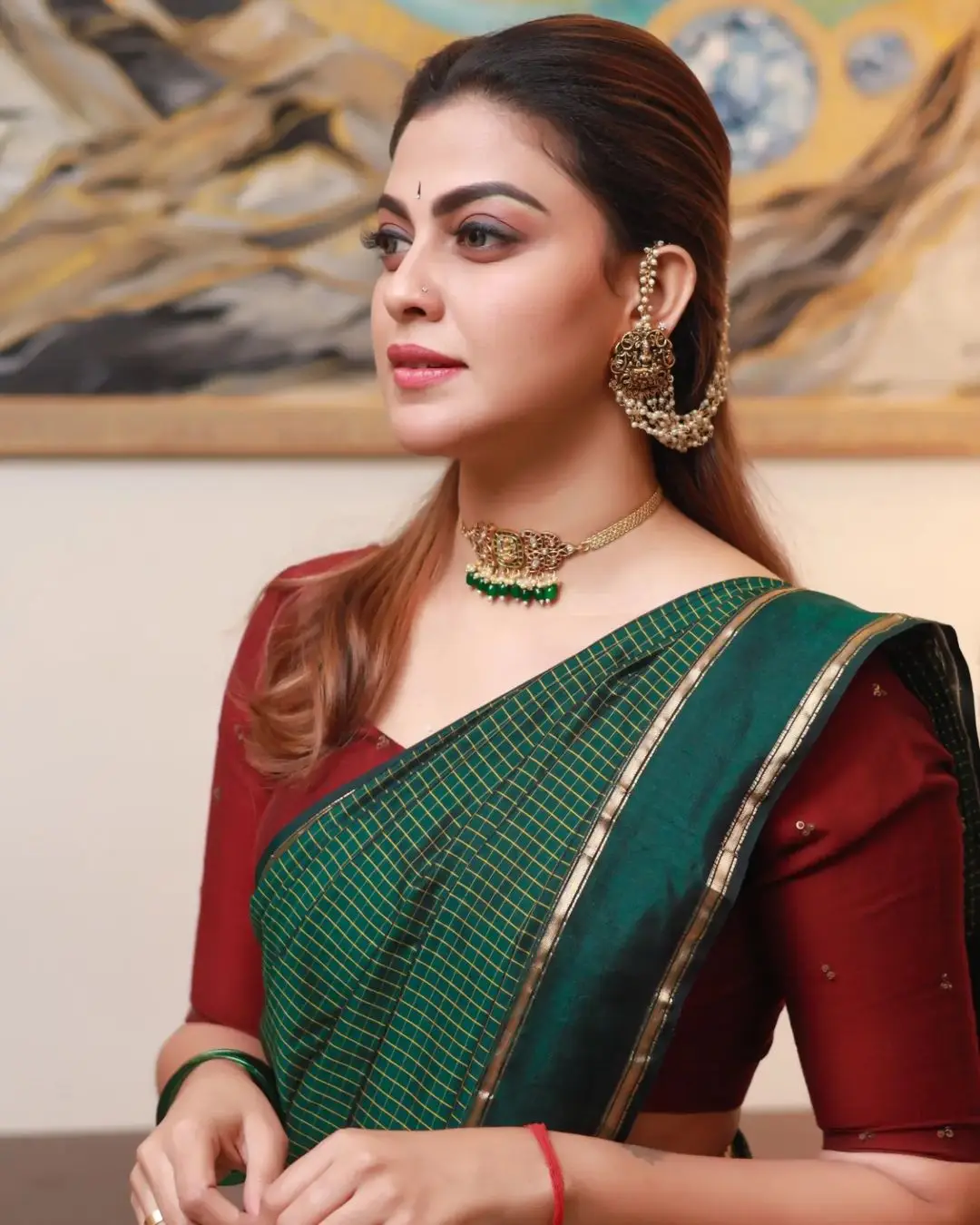 MALAYALAM ACTRESS ANUSREE NAIR IN GREEN SAREE MAROON BLOUSE